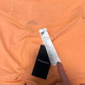 Fabletics Vibrant Orange Shorts